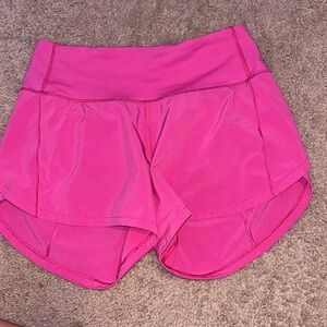 Lululemon sonic pink speed ups 4 inch size 0